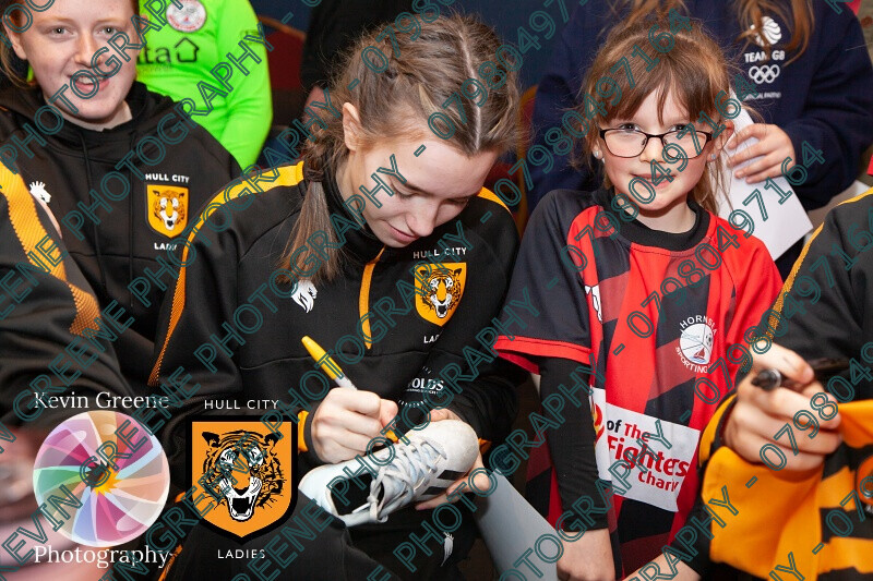 hullcityladiesfc-370 
 Hull City Ladies FC players engage with their younfg supporters and have the presence of their ambassodor Carol Thomas; former England Womens Captain 
 Keywords: sports photography, hull photographers, brand photography, kevin@kevingreenephotography.co.uk, sports team headshots, personal brand photography, womens football, sports magazines, photographers hull, kevin greene photography, photography, strong visuals, sport for girls, hope&glory, sports headshot photography, wolds engineering services, marketing, football supporters, reds10 Ltd, hull city ladies, brand awareness, photographers near me, community engagement, sport for women, photos for marketing, marketing content, visual content for marketing, photographers, sports in hull, women in football, engage with your supporters, kevin greene brand photography, hull city ladies fc