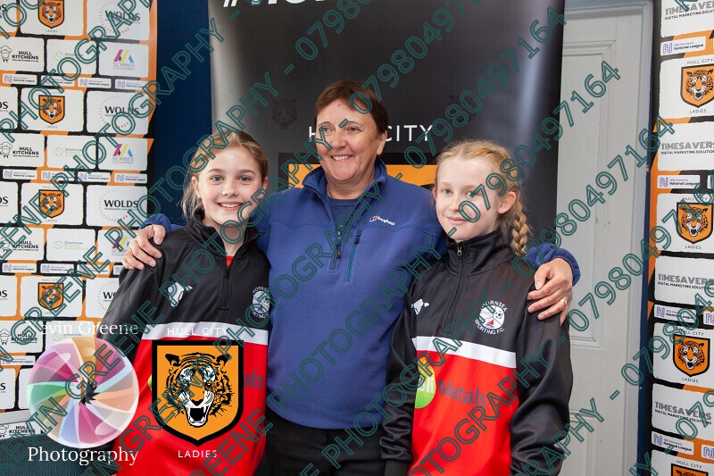 hullcityladiesfc-382 
 Hull City Ladies FC players engage with their younfg supporters and have the presence of their ambassodor Carol Thomas; former England Womens Captain 
 Keywords: sports photography, hull photographers, brand photography, kevin@kevingreenephotography.co.uk, sports team headshots, personal brand photography, womens football, sports magazines, photographers hull, kevin greene photography, photography, strong visuals, sport for girls, hope&glory, sports headshot photography, wolds engineering services, marketing, football supporters, reds10 Ltd, hull city ladies, brand awareness, photographers near me, community engagement, sport for women, photos for marketing, marketing content, visual content for marketing, photographers, sports in hull, women in football, engage with your supporters, kevin greene brand photography, hull city ladies fc